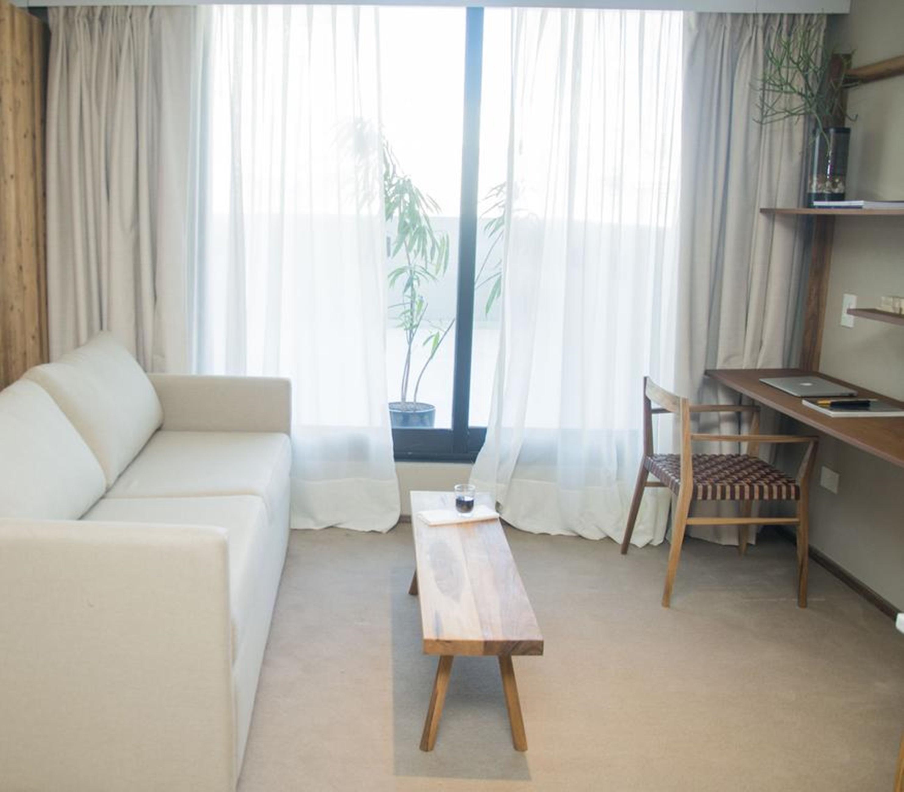 Aq Tailored Suites Buenos Aires Kültér fotó A room at the hotel