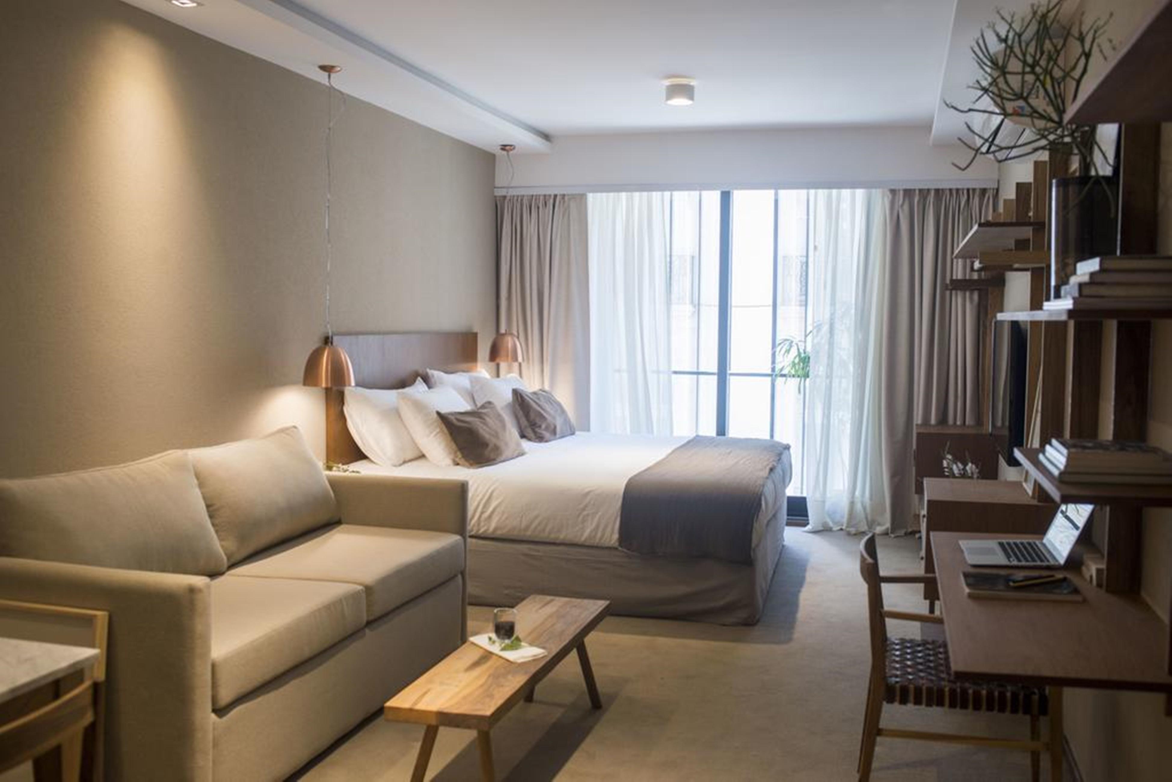 Aq Tailored Suites Buenos Aires Kültér fotó A room at the hotel