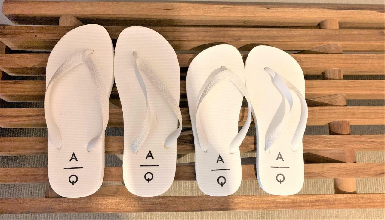 Aq Tailored Suites Buenos Aires Kültér fotó A pair of AQ flip-flops