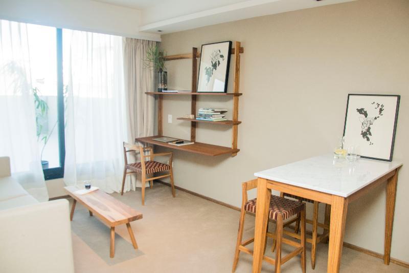 Aq Tailored Suites Buenos Aires Kültér fotó A wall-mounted desk